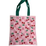 Carry your essentials in style with the vibrant, eco-friendly Cherries Reusable Tote Bag