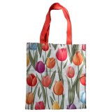 Carry your essentials in style with the eco-friendly Tulips Reusable Tote Bag