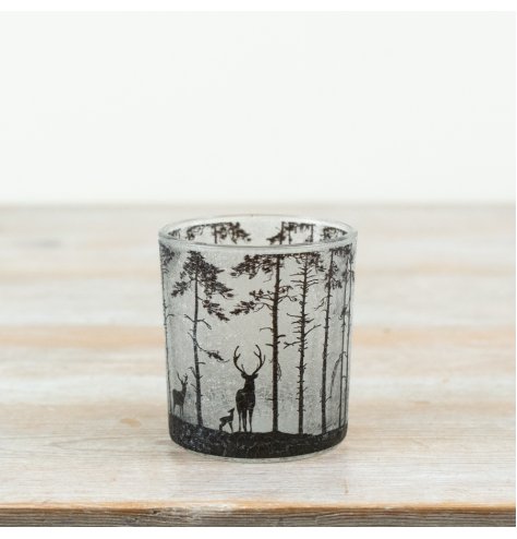 Elegant glass candle holder with frosted tree and deer design,