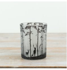 a nordic inspired deer and tree candle holder 