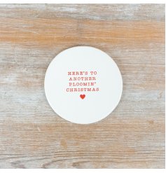 Bring festive cheer to your holiday table with this delightful coaster.