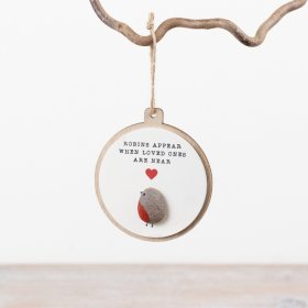 Bring nature indoors with this charming 3D hanging pebble sign for your home décor.