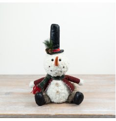 Bring joy with this delightful snowman sitting decoration, perfect for festive winter displays.