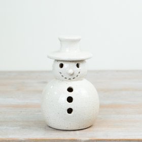 Snowman ornament is crafted from stoneware and finished with a subtle crackle glaze that adds texture and character