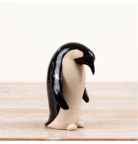 Enhance your decor with this stylish, modern ceramic penguin ornament for a chic interior touch.