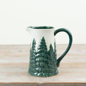 Crafted in ceramic with layered tree detailing and a glossy green finish