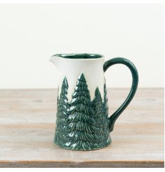 This 19cm ceramic jug features a beautifully detailed raised Christmas tree design in rich green tones