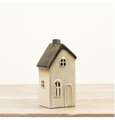 Tall ceramic house t-light holder with a soft cream glaze and contrasting grey metallic roof detail.