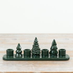 Bring natural charm with this dark green candle holder shaped like a tree.