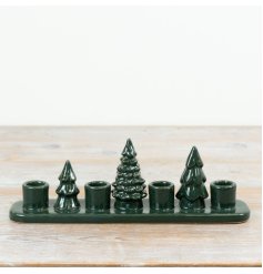 Add a touch of natural elegance with this dark green Tree Candle Holder