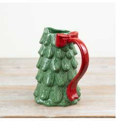 Bring festive charm to seasonal table settings with this eye-catching ceramic Christmas tree jug.