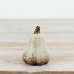 Bring cozy fall vibes to your space with this intricately designed pumpkin decor.