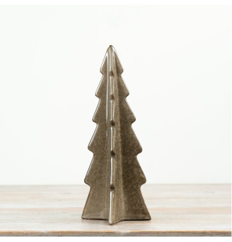 Modern ceramic Christmas ornament with a sleek, stylized design and detailed layered branches.
