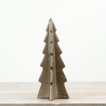 Sleek ceramic Christmas tree ornament with a modern, stylized shape and detailed layered branches.