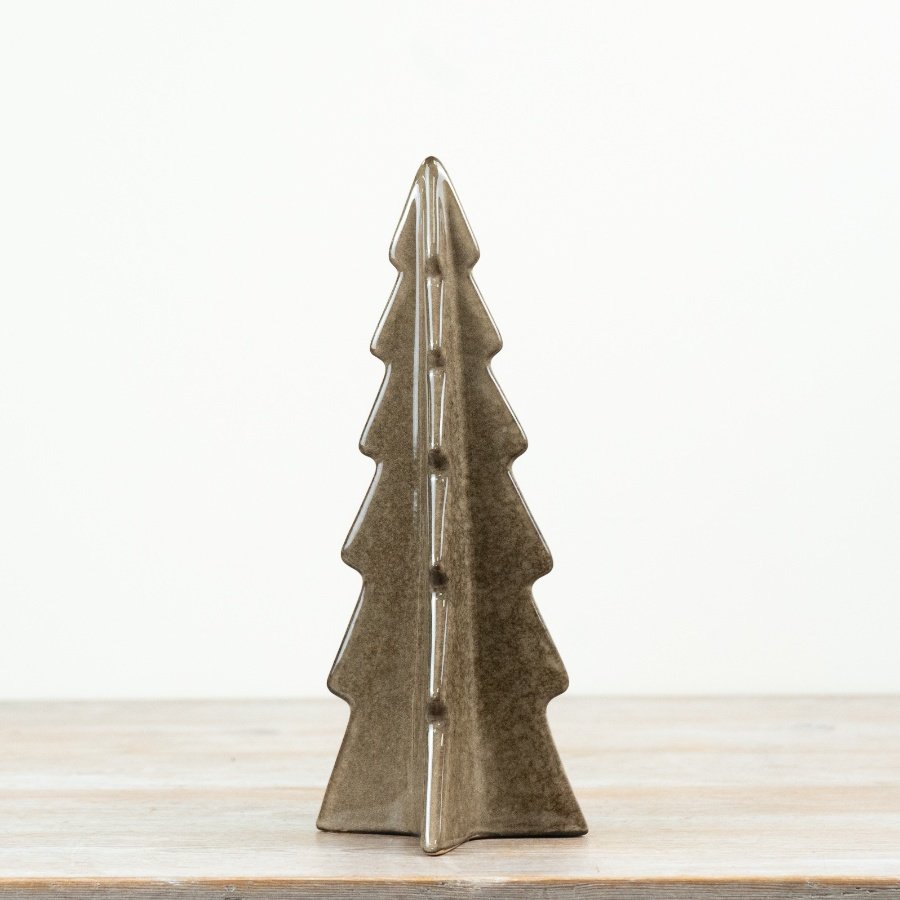 A stylish ceramic Christmas tree decoration with a clean, sculpted silhouette and warm neutral glaze.