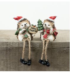 Bring holiday cheer to your space with this cute Resin Christmas Hedgehog shelf decoration.