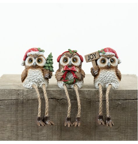 Bring holiday cheer with this charming Resin Owl Xmas Shelf Sitter for your festive décor.