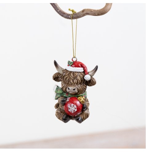 Bring holiday cheer with this Resin Highland Cow Ornament, perfect for festive décor.