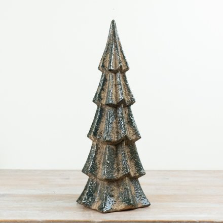 Finished in a rustic green glaze with layered branch detailing, this 46cm decorative tree adds height and texture.