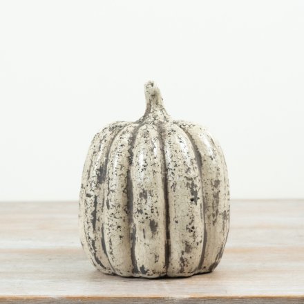 Bring cozy fall vibes to your space with this stylish pumpkin decoration.