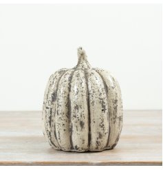 Bring cozy fall vibes to your space with this stylish pumpkin decoration.