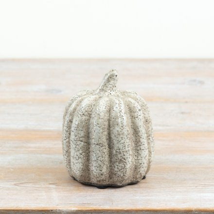 Add a charming touch to your home with this smooth ceramic pumpkin