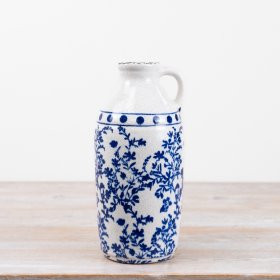 Bring timeless elegance to your interiors collection with this beautifully crafted blue and white ceramic jug vase.