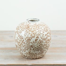 A chic clara vase featuring an elegant pattern.