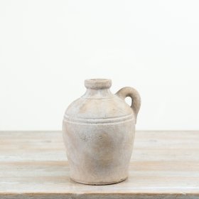 This vase offers timeless country charm with its aged stone-effect finish and classic amphora shape.