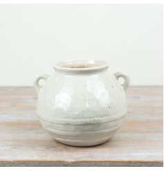 Elegant ceramic round vase with handle perfect for adding timeless charm