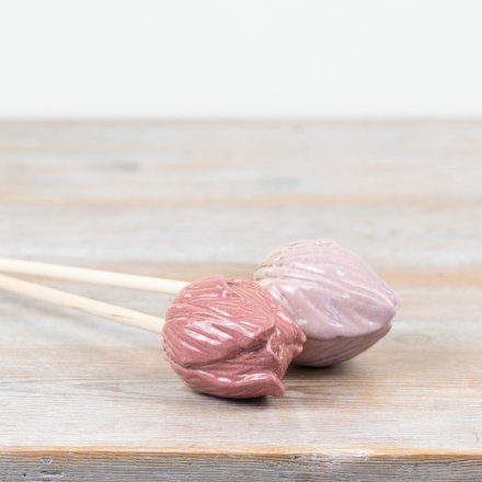 Add a charming touch to your garden with thi speckled pink ceramic tulip stake