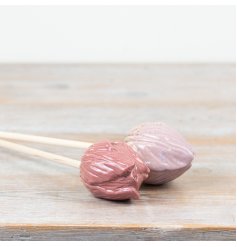 Add a charming touch to your garden with thi speckled pink ceramic tulip stake