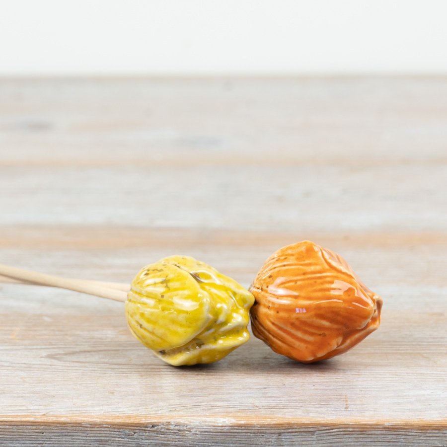 Add charm with this 25cm yellow tulip featuring a lovely speckled design to brighten any room.