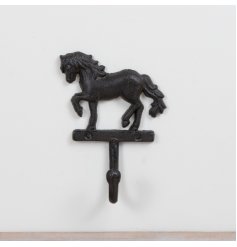 Bring rustic charm home with this intricately designed brown horse-shaped wall hook.