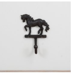 Bring rustic charm home with this intricately designed brown horse-shaped wall hook.