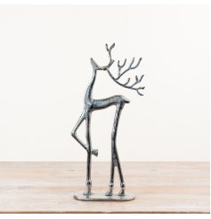 Adorable reindeer figure mounted on a sturdy base.