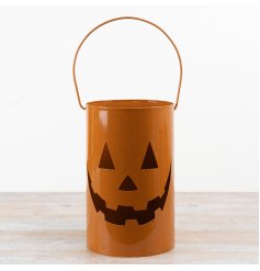 A charming pumpkin design lantern with handles 
