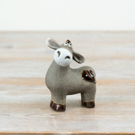 A fun yet tasteful decorative accent that adds personality and warmth to any interiors collection. 