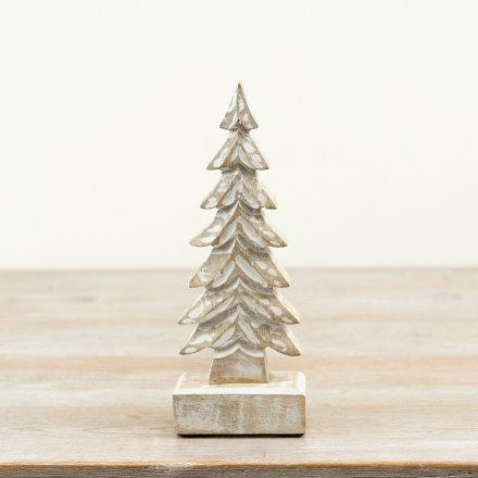 Minimalist wooden ornament shaped like a tree, perfect for festive decor.