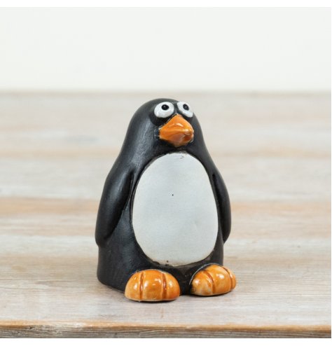 Bring a light-hearted touch to your seasonal and animal-themed collections with this charming ceramic penguin decoration