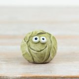 Compact and easy to merchandise, this decorative piece is a unique gift