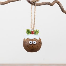 Bring classic holiday warmth with this cozy Christmas pudding tree ornament.