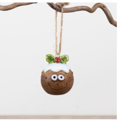 Bring festive warmth to your holiday with this charming Christmas pudding tree hanger.