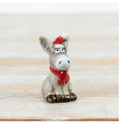 An adorable ceramic donkey Christmas ornament for your seasonal decor.