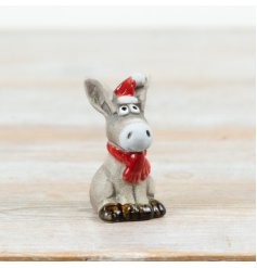 Add festive character to your seasonal collection with this charming ceramic donkey Christmas decoration.