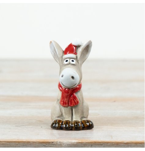 Charming 10cm ceramic donkey ornament in a cute sitting pose.