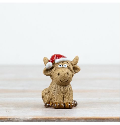 6cm ceramic Highland cow figurine from the Rosy Eyes collection, perfect for display.
