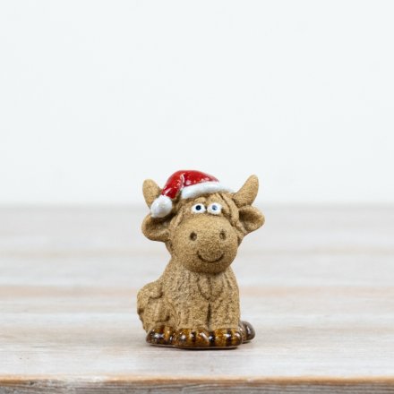 6cm ceramic Highland cow figurine from the Rosy Eyes collection, perfect for display.