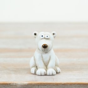 Add a touch of charm and character to seasonal and everyday displays with this adorable polar bear ornament
