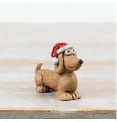 Bring instant Christmas cheer to your range with this charming dog decoration